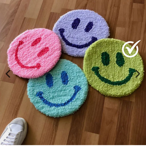 green rug with check mark